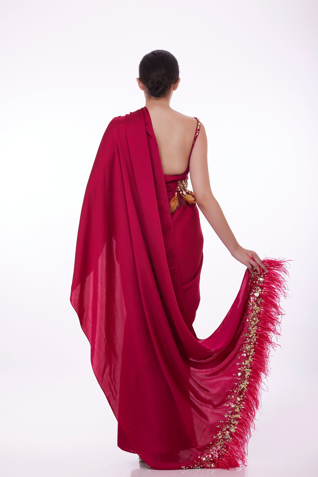 Pink blouse with pre draped sari with fringed feather pallu