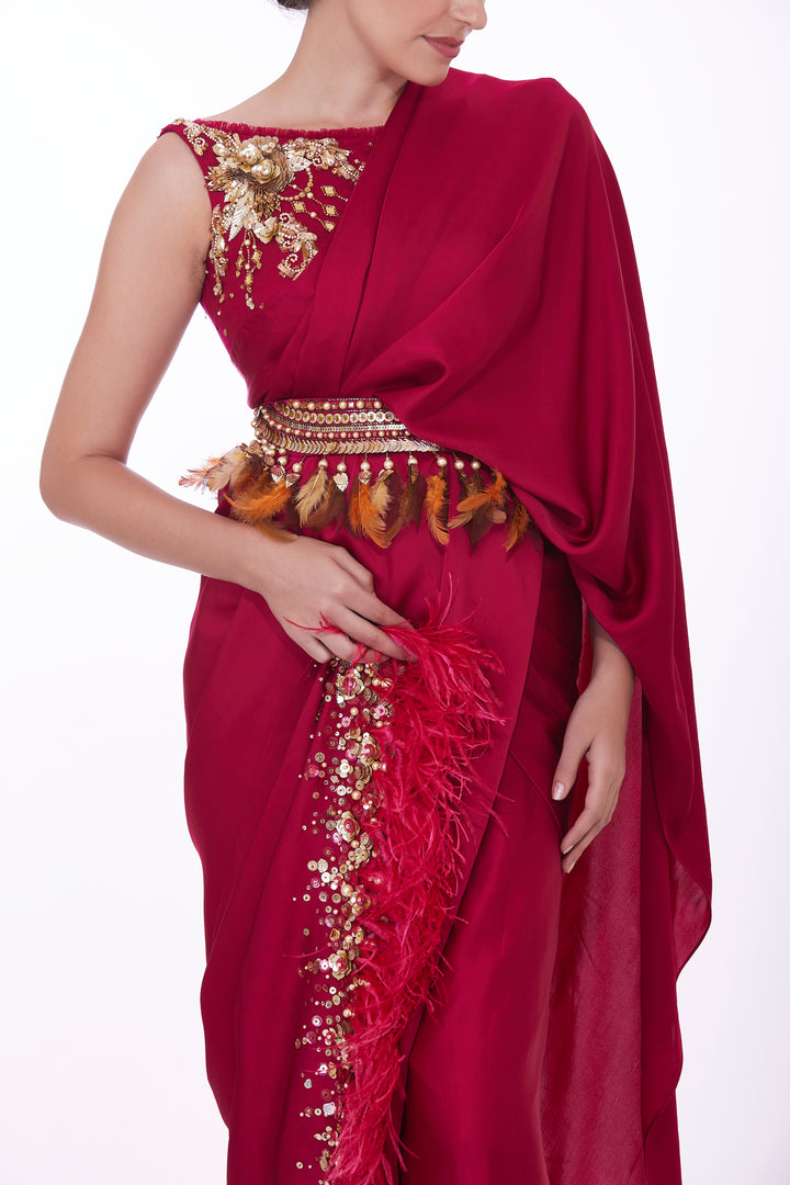 Pink blouse with pre draped sari with fringed feather pallu