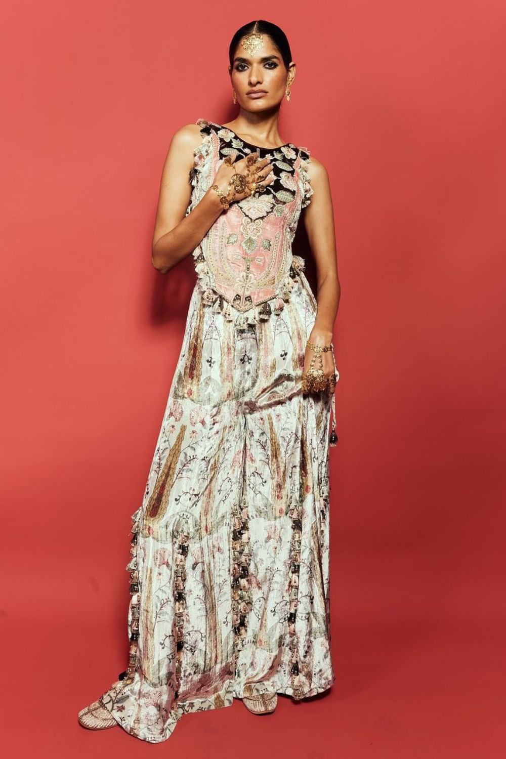 Kainat Embroidered Velvet Back Tie-up Choli & Sharara.