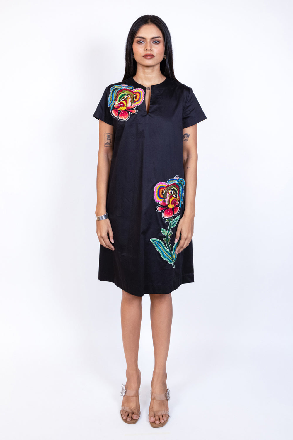Mid length Embroidered Patch Peplum Top