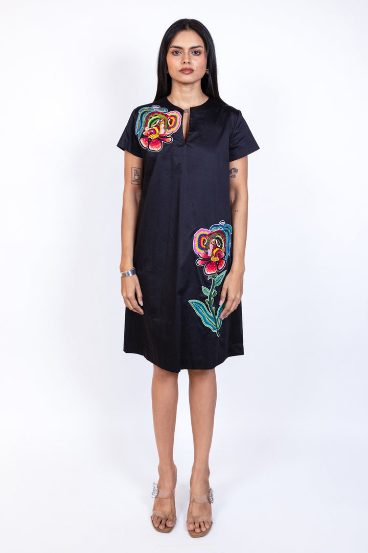 Mid length Embroidered Patch Peplum Top