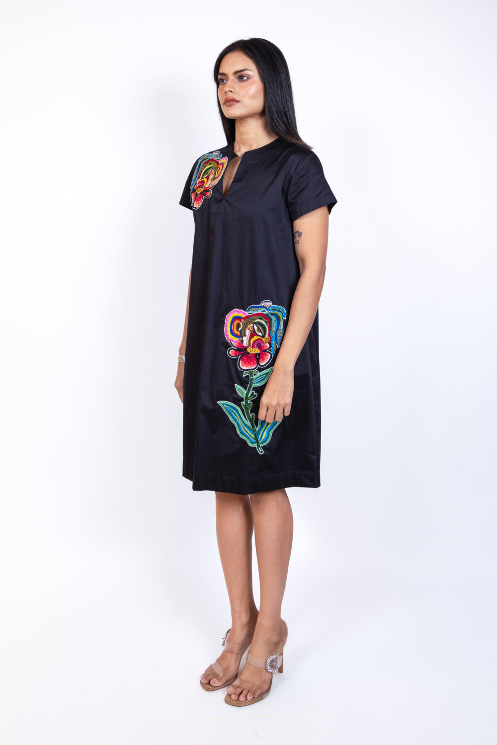Mid length Embroidered Patch Peplum Top