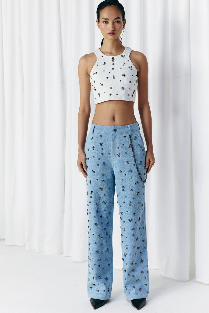 WASHED DENIM STUDDED JEANS