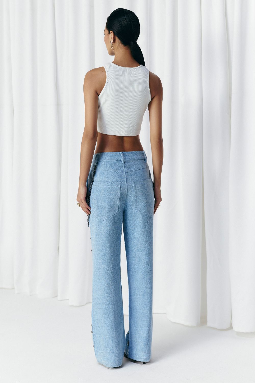 WASHED DENIM STUDDED JEANS