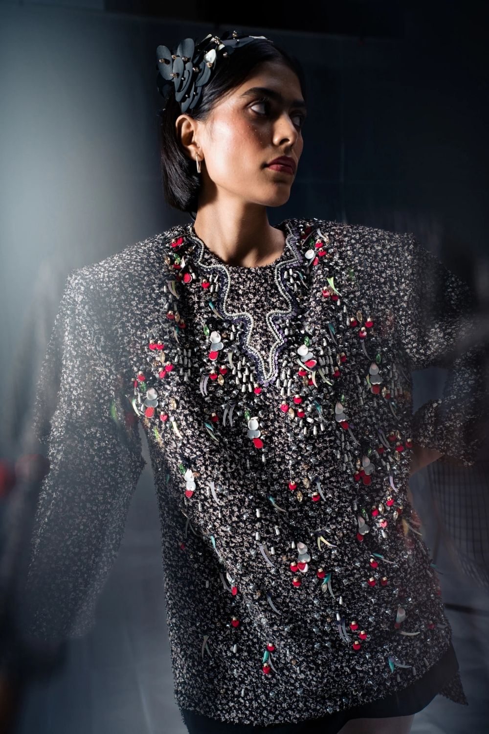 origami sequin dress Swipe to see #odlrspring2025 rose motif come to life in the #odlratelier. 1. An origami rose motif in vermillion 2. A sequin rose in the hue tea rose, embroidered on a peridot