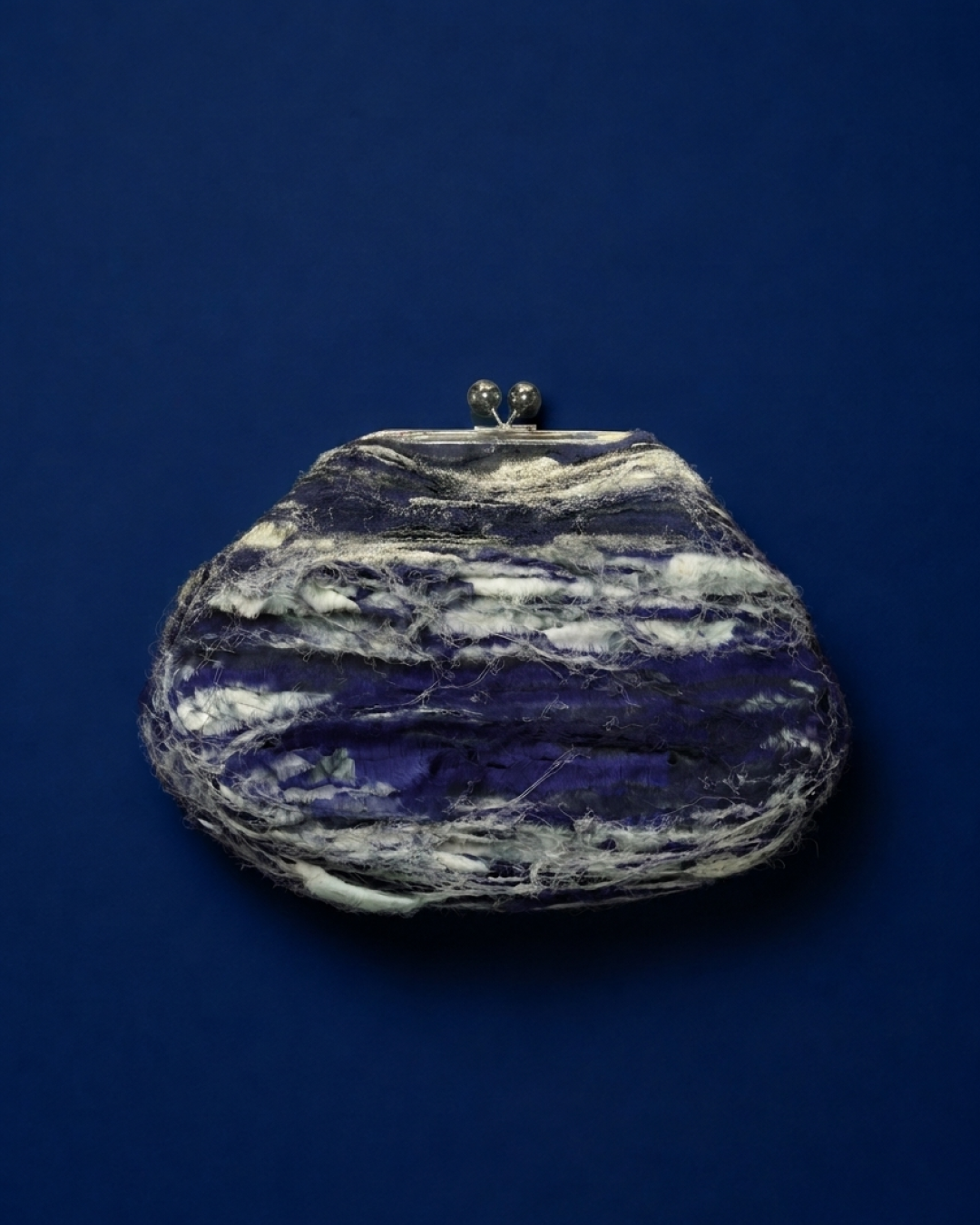 Shredded Carmela Clutch