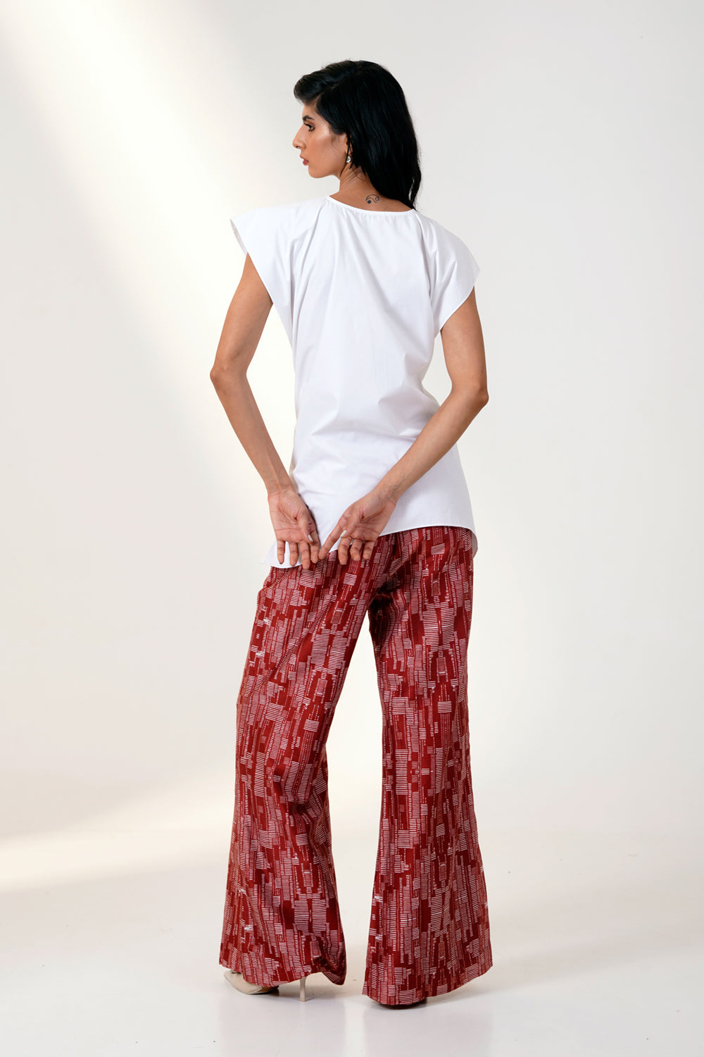 Martina Ii Bow Clutch Top With Printed Bell Bottoms