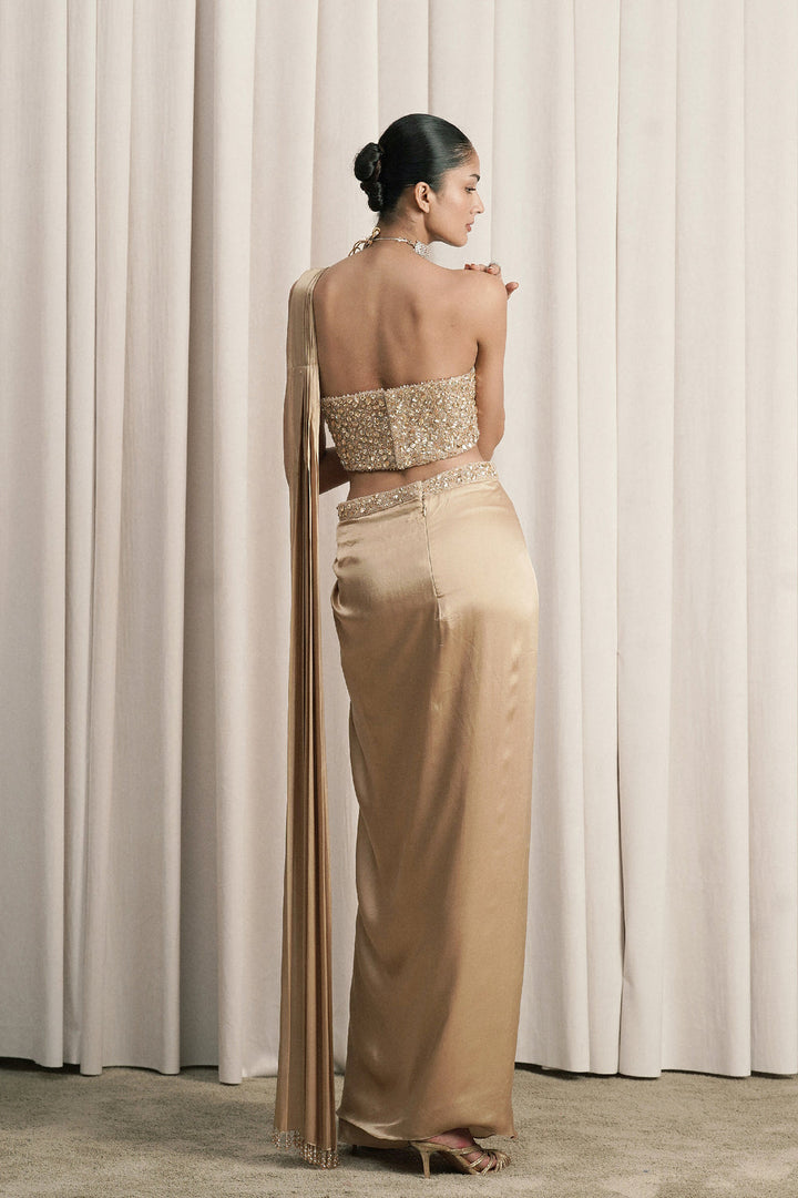 Beige Draped Saree With Embellished Corset