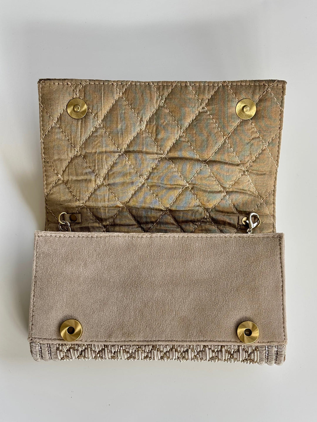 THE PIQUÉ CLUTCH