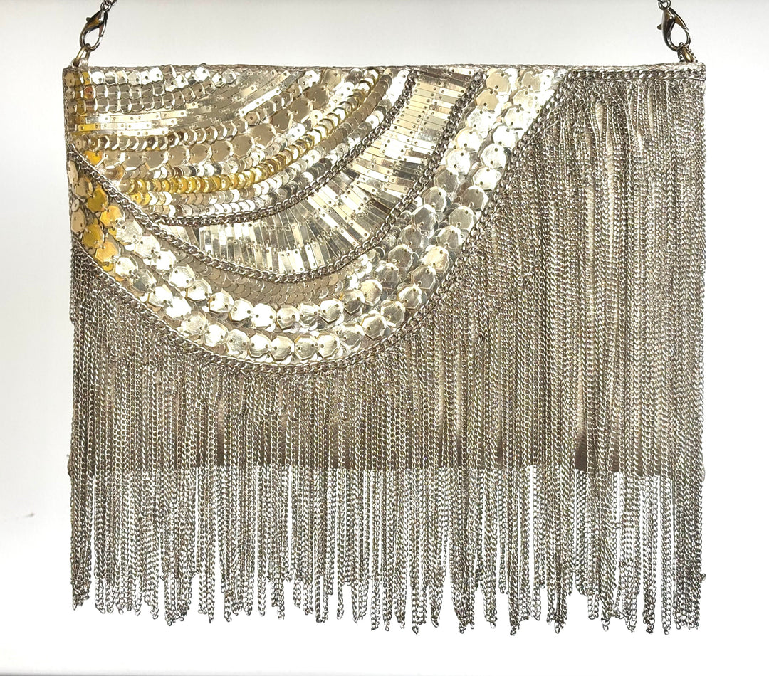 THE ARCHE CLUTCH (FLAPPER)