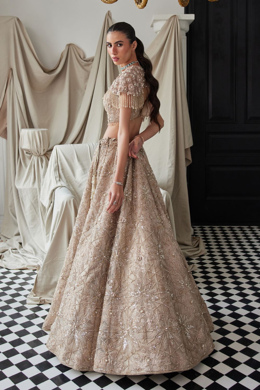 Beige Lehenga with an Embellished Shoulder Cape