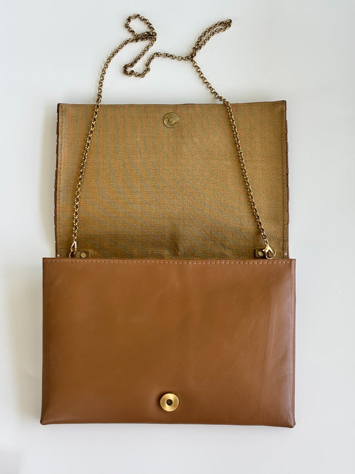 THE CUIR CLUTCH