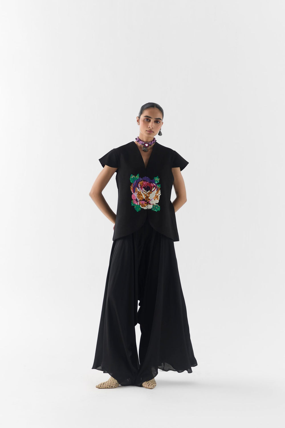 Black Garden Rose Vest and Dhoti Pants front view on model in floral occasion set
