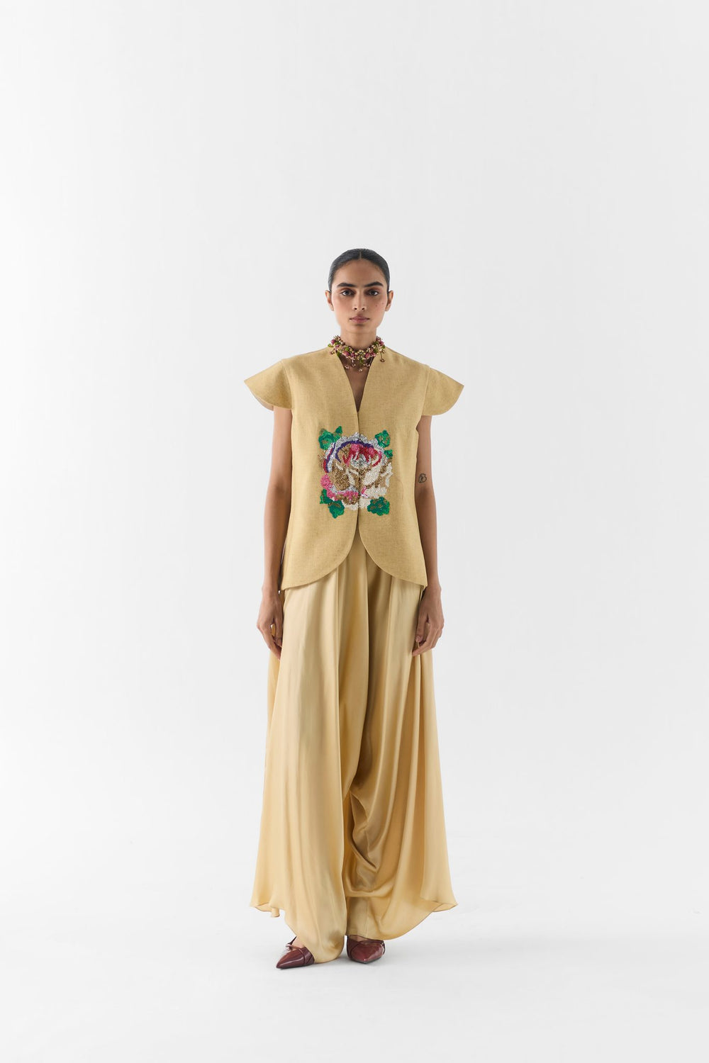 Gold Garden Rose Vest and Dhoti Pants front view on model in festive floral set