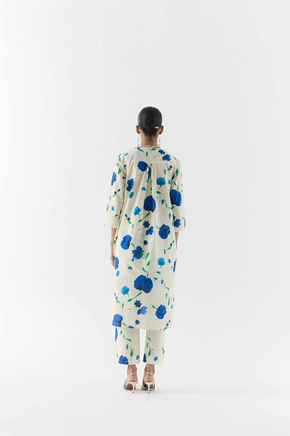 Close-up of the moss rose floral print fabric on the kurta