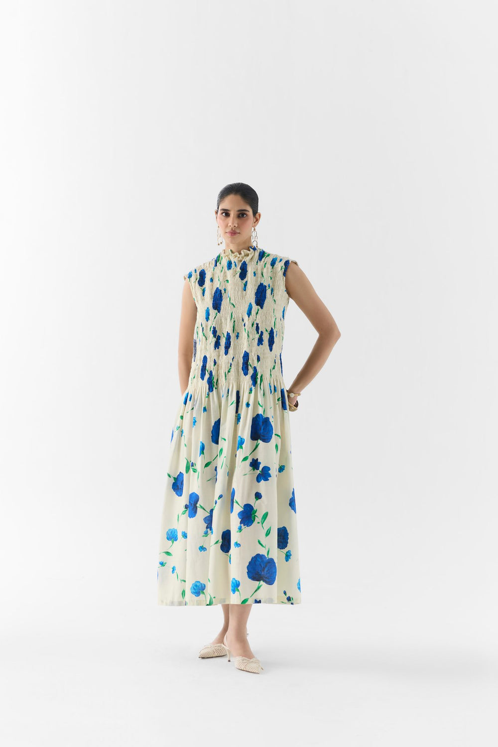 Side view of the Moss Rose ruched dress showing gathered waist