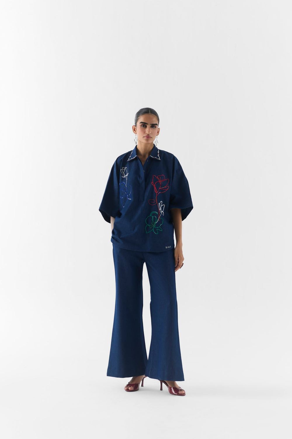 Side view of the Posy Denim Co-Ord showing tailored fit and clean denim silhouette