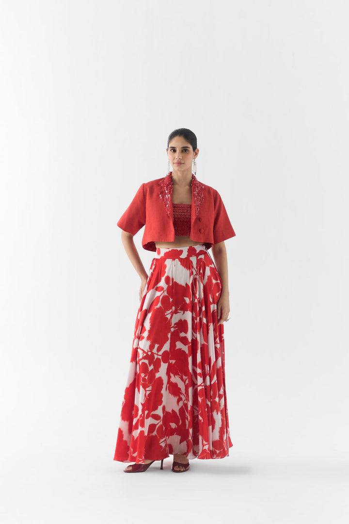 Side view of Red Ink leather skirt showing silhouette and blouse fit