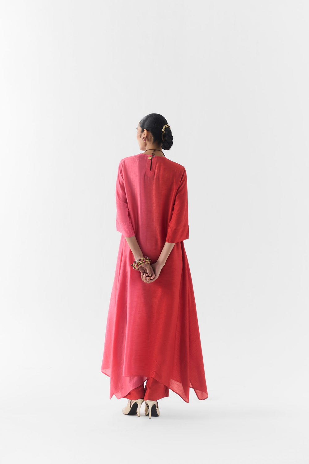 Back view of the Ruby kurta set in rich red tones